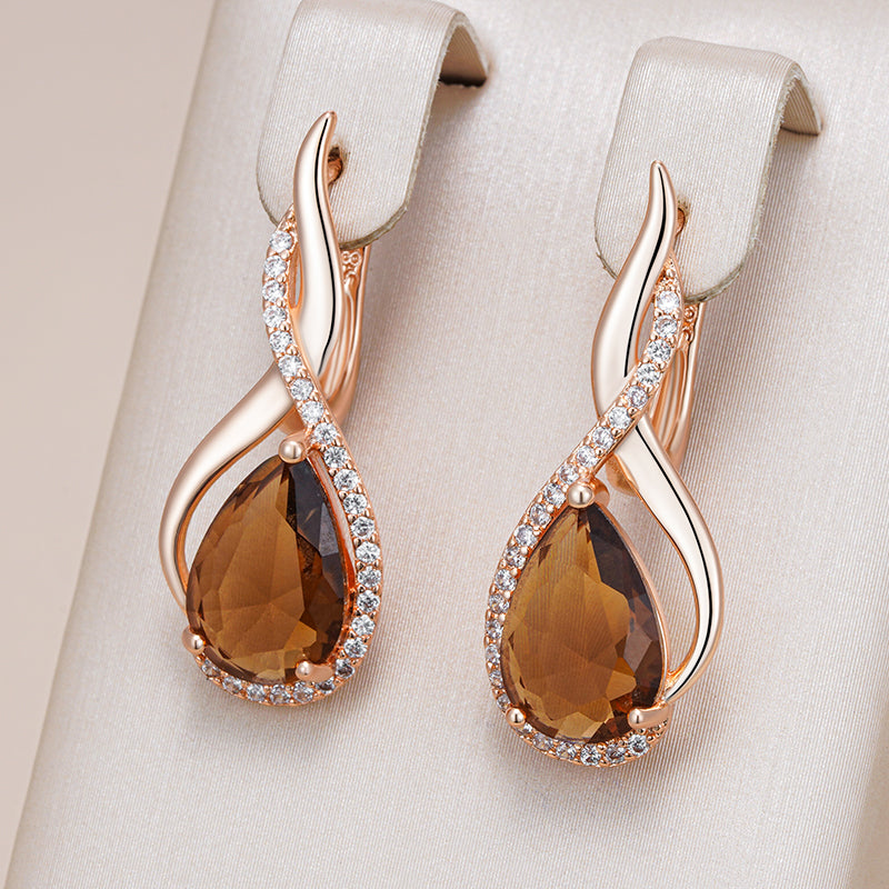 Elegante braune Wassertropfen-Ohrringe in Gold