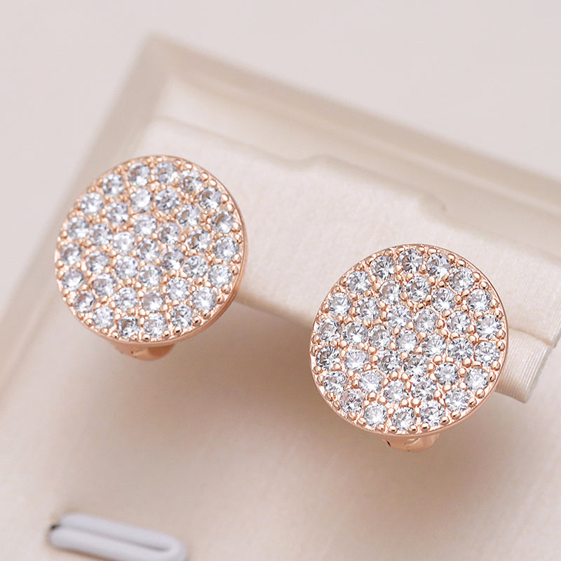 Elegante goldene Ohrringe mit Zirkonia-Intarsien